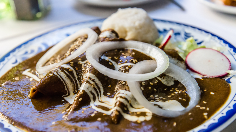 Illustration for article titled Holy molé: A beginner's guide to Mexico’s heaven-sent sauce
